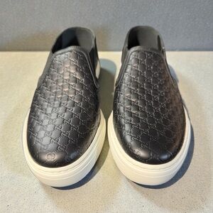 Authentic Gucci Embossed Black Leather Slip-On Loafers